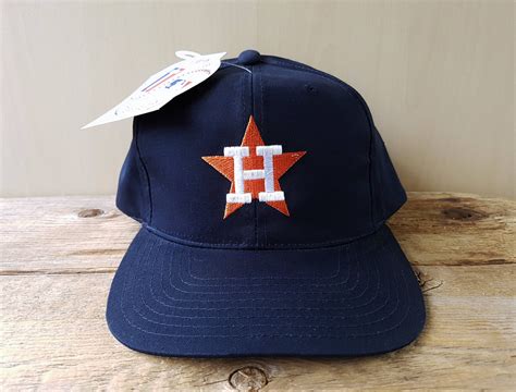 The fitted hats in this collection are mostly New Era branded caps that are created using corduroy material (corduroy visor or corduroy undervisor or full corduroy crown). . Astros vintage cap